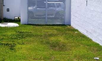 Imagem 2: Casa térrea com 2 quartos no Parque Guará com arquitetura moderna e pé direito duplo na sa