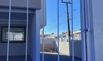 Imagem 2: Sobrado para venda possui 98 metros quadrados com 3 quartos em Nova Palhoça - Palhoça - SC