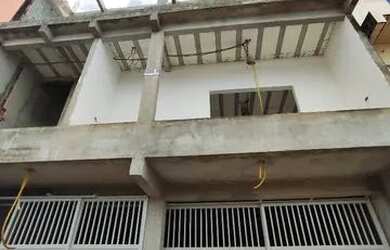 Imagem 4: Vendo este imóvel com garagem e 2 casas com laje pra fazer mais uma casa