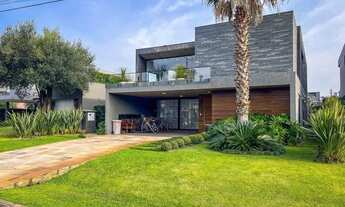 Imagem 3: Casa beira lago mobiliada e decorada com 05 suítes e piscina à venda - Condomínio Enseada