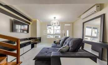 Imagem 2: Casa em condomínio mobiliada com 3 dormitórios, sendo 1 suíte, e 2 vagas de garagem no bai