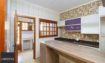 Imagem 4: Casa de 3 dormitórios a venda no bairro Guarujá, Porto Alegre