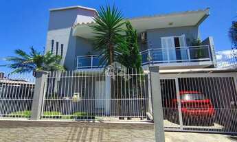 Imagem 3: Sobrado 4 dormitórios sendo um suíte master com sacada Niterói Canoas