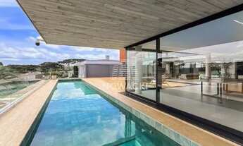 Imagem 7: CASA DE ALTISSIMO PADRÃO EM CONDOMÍNIO! POSSUI 4 SUÍTES E 4 VAGAS DE GARAGEM!