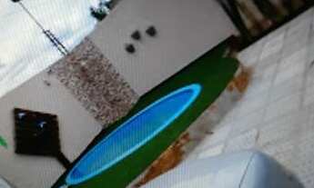 Imagem 6: Casa com espaço gourmet completo, piscina e garagem para 5 carros