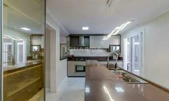 Imagem 6: Casa em condomínio mobiliada com 3 dormitórios, sendo 1 suíte, e 2 vagas de garagem no bai