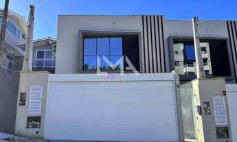 Imagem: CASA GEMINADA COM 3 SUÍTES A VENDA EM ITAPEMA