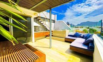 Imagem 4: A cobertura duplex completamente reformada possui um design moderno e sofisticado, com aca