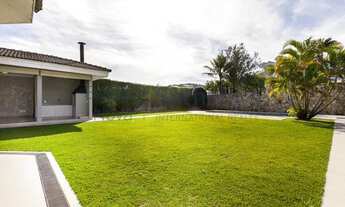 Imagem 7: Casa com ampla área externa em condomínio fechado