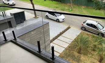 Imagem 6: Casa de condomínio à venda, com 445 metros quadrados e 4 suítes