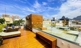 Imagem 7: A cobertura duplex completamente reformada possui um design moderno e sofisticado, com aca