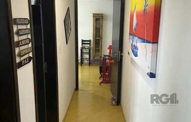 Imagem 7: Apartamento de 2 dormitórios, sala, cozinha, banheiro, área de serviço com vaga de garagem