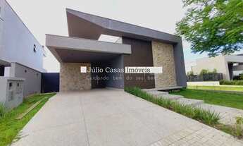 Imagem 2: Casa térrea em condomínio com 4 suítes