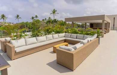 Imagem 6: Excelente flat em muro alto próx da praia