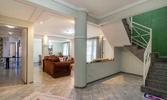 Imagem 4: Excelente sobrado com espaço comercial no térreo com 5 quartos sendo 4 deles Suítes à vend