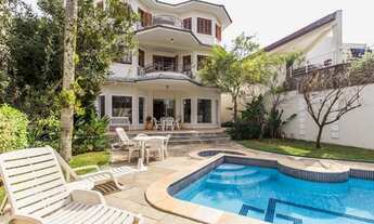 Imagem: Casa com 600m², área de terreno, 04 suítes