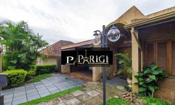 Imagem 2: Casa com 4 dormitórios para alugar, 270 m² por R$ 6.600,00/mês - Medianeira - Porto Alegre