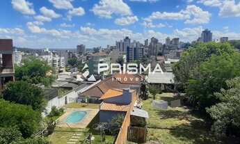 Imagem 4: 2 dormitórios, suíte, sacada com churrasqueira, garagem e elevador