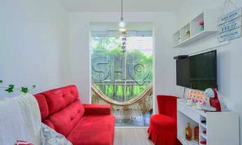 Imagem 5: Apartamento térreo com árvores ao lado da varanda, sensação de casa estilo chácara, semi m