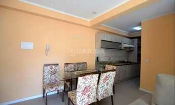 Imagem 2: Apartamento com sacada e 2 dormitórios para alugar no bairro Cavalhada