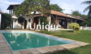 Imagem: Casa linear com amplo terreno e vista para