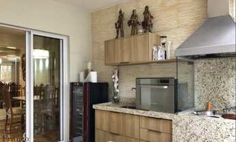 Imagem 6: Casa de condomínio para venda tem 326 metros quadrados com 4 quartos