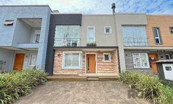 Imagem 2: Casa Condominio em Porto Alegre, no bairro Hípica, com 3 dormitório(s), e 3 banh