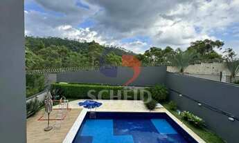 Imagem 3: CASA A VENDA NO RESIDENCIAL TAMBORE 10 ALPHAVILE 4 SUÍTES SEMI MOBILIADA