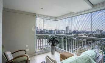 Imagem 3: Apartamento com 3 suítes e uma espaçosa varanda gourmet com vista para o Golf Club