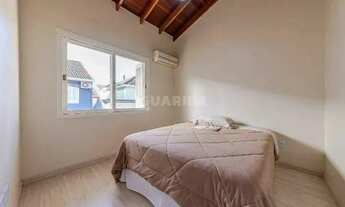 Imagem 16: Casa em condomínio mobiliada com 3 dormitórios, sendo 1 suíte, e 2 vagas de garagem no bai