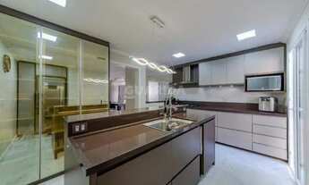 Imagem 5: Casa em condomínio mobiliada com 3 dormitórios, sendo 1 suíte, e 2 vagas de garagem no bai