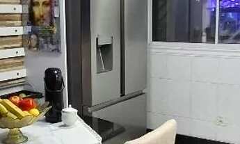 Imagem 6: Sobrado geminado com planejados e garagem c/ 2 vagas