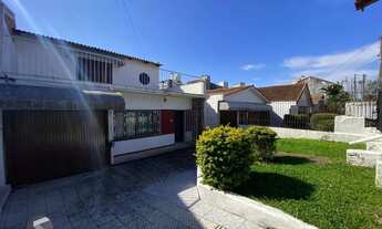 Imagem 2: Casa de (3)três quartos, sendo uma suíte com duas vagas de garagem