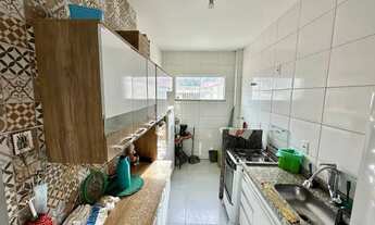 Imagem 6: Vendo apartamento no térreo com 2 quartos sendo 1 suíte, bom acabamento, 1 vaga de garagem