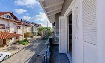 Imagem 14: Casa em condomínio mobiliada com 3 dormitórios, sendo 1 suíte, e 2 vagas de garagem no bai