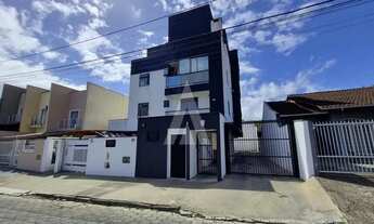 Imagem 3: Apartamento com 2 quartos, sacada com churrasqueira e 1 vaga de garagem coberta no bairro