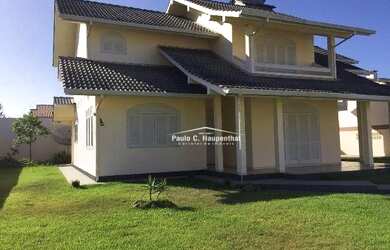 Imagem 3: Casa com 4 dormitórios, sendo 01 suíte, sala de estar e jantar, 02 vagas de garagem, varan