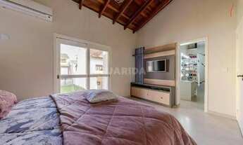 Imagem 12: Casa em condomínio mobiliada com 3 dormitórios, sendo 1 suíte, e 2 vagas de garagem no bai