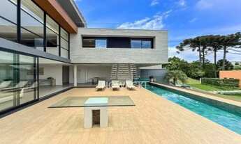 Imagem 5: CASA DE ALTISSIMO PADRÃO EM CONDOMÍNIO! POSSUI 4 SUÍTES E 4 VAGAS DE GARAGEM!