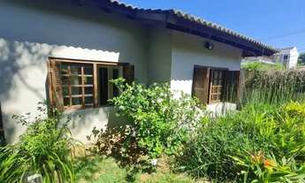 Imagem 5: Casa em lindo terreno alto ao nível da rua medindo 10 × 32 onde consta uma residência térr