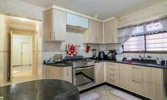 Imagem 6: Excelente sobrado com espaço comercial no térreo com 5 quartos sendo 4 deles Suítes à vend