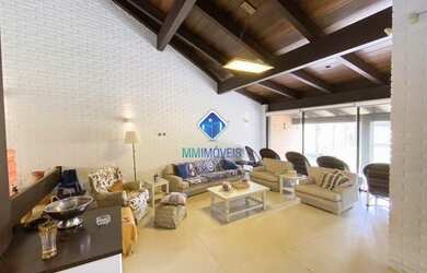 Imagem 6: Casa com 410m² distribuídos em 06 dormitórios sendo 03 suítes, 02 vagas, no bairro Praia G