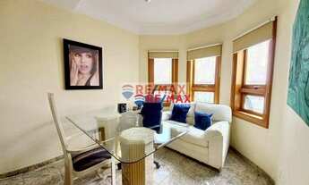 Imagem 7: A casa amarela com jardim rosa. Uma linda casa em condomínio tranquilo