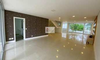 Imagem 2: Casa em condomínio de 425m², 4 quartos, 4 suítes, 4 vagas, 7 banheiros