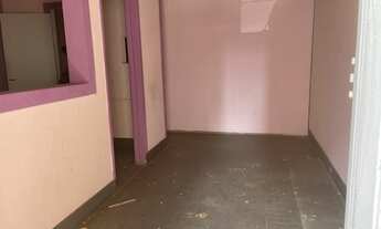 Imagem 6: Hall social, sala, cozinha, lavanderia, corredor externo na lateral da casa e edícula no f