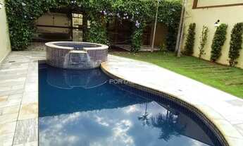 Imagem: Área de lazer moderna e acabamento rústico