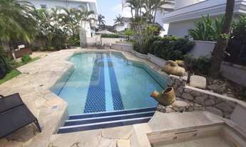 Imagem 2: Casa de condomínio para aluguel e venda possui 600 metros quadrados com 7 quartos