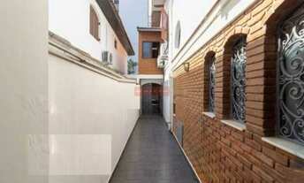 Imagem 5: Sobrado com 3 dorm sendo 1 suite, 2 salas, coz, churrasqueira, 2 vagas, 4 Wcs. Oportunida