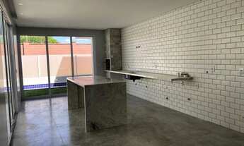 Imagem 3: Casa térrea Jardins Bolonha 3 Suites piscina com Deck Garagens 4 carro acabamento de Prime