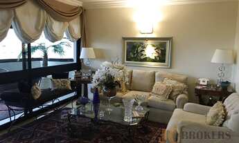 Imagem 1: Apartamento mobiliado com 218m² de área útil, 3 vagas, amplo living, 4 dormitórios, 4 suít